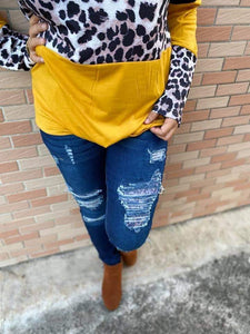 DISTRESSED STRETCH PATCH DENIM